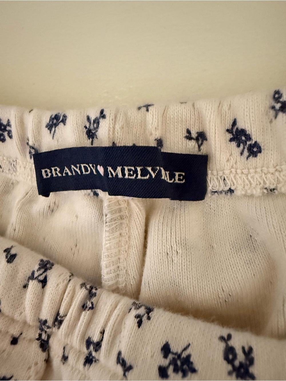 Brandy Melville Cream Knit Shorts with Navy Floral Print